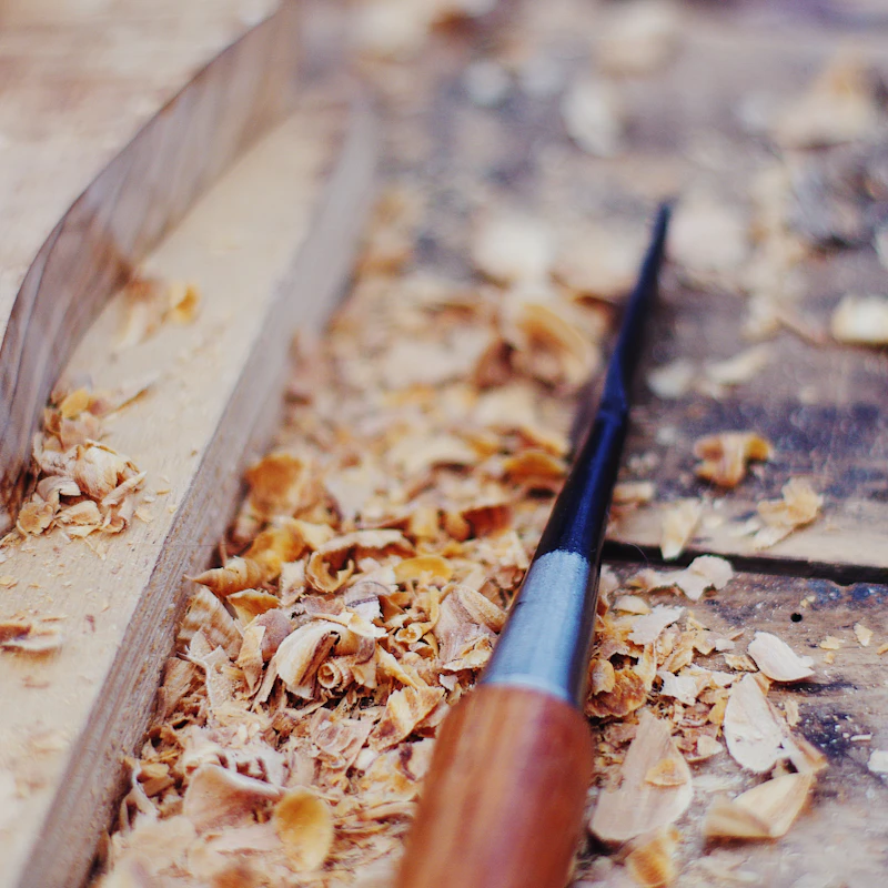 Chisel and shavings on the workbench