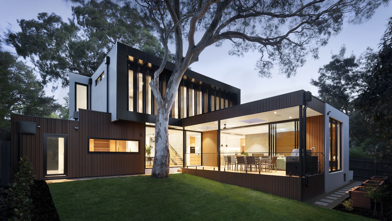 Villa Skoglund — a modern timber house at dusk